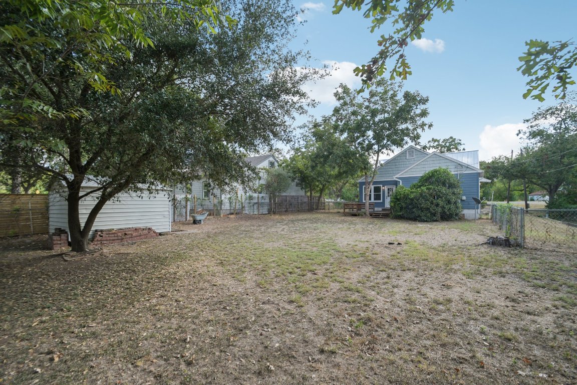 308 Taylor Road Elgin, TX 78621 - Photo 29 of 29 Fenced backyard featuring a deck