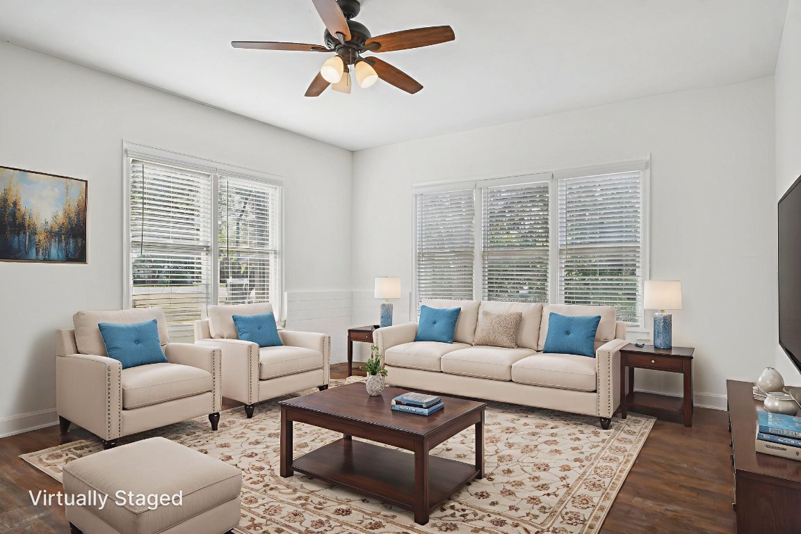 308 Taylor Road Elgin, TX 78621 - Photo 4 of 29 Living room featuring dark wood-style floors and a ceiling fan