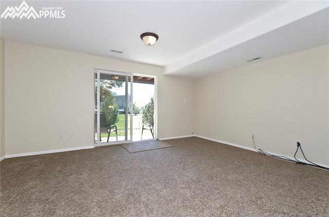 3539 Indigo Ridge Point Colorado Springs, CO 80910 - Photo 20 of 35 Basement - Bedroom / Rec room is walk out