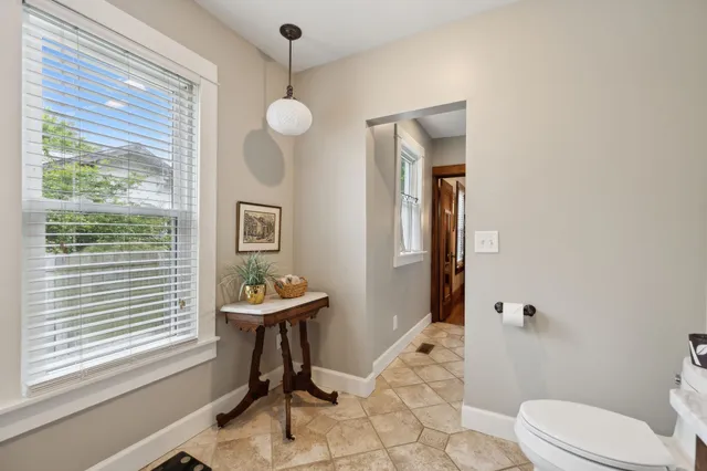 a view of a living room and hardwood floor