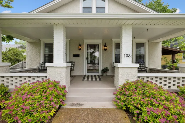 a outdoor space with chairs and deck