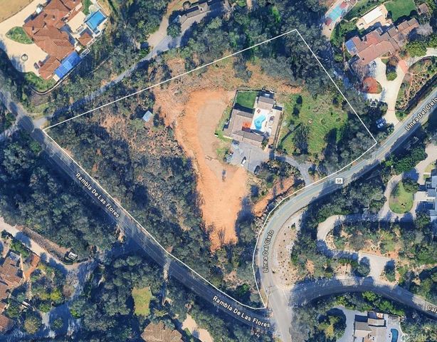 a bird view of house with outdoor space