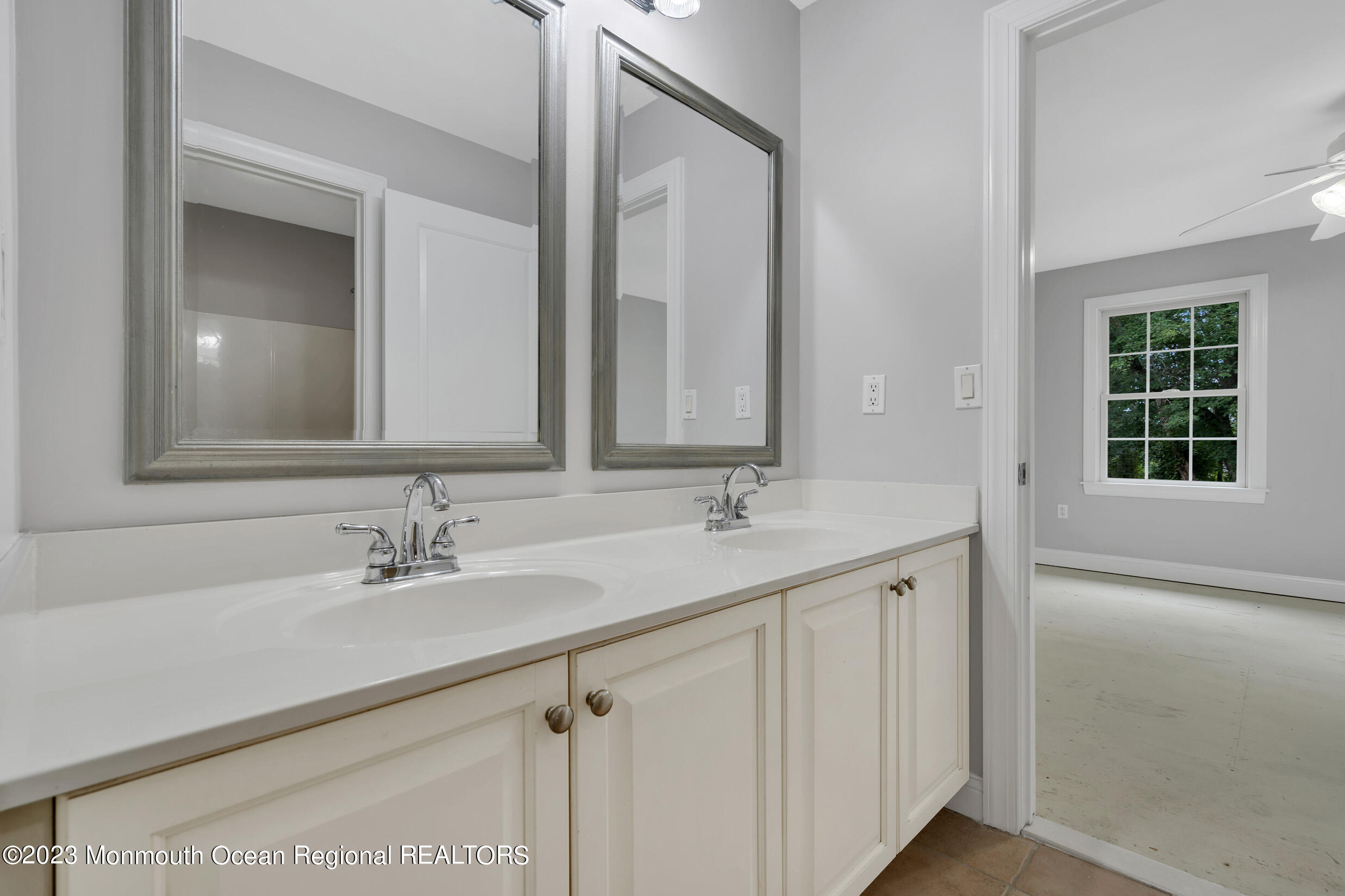 990 Farmingdale Road Jackson, NJ 08527 - Photo 34 of 67 a bathroom with a sink and a mirror