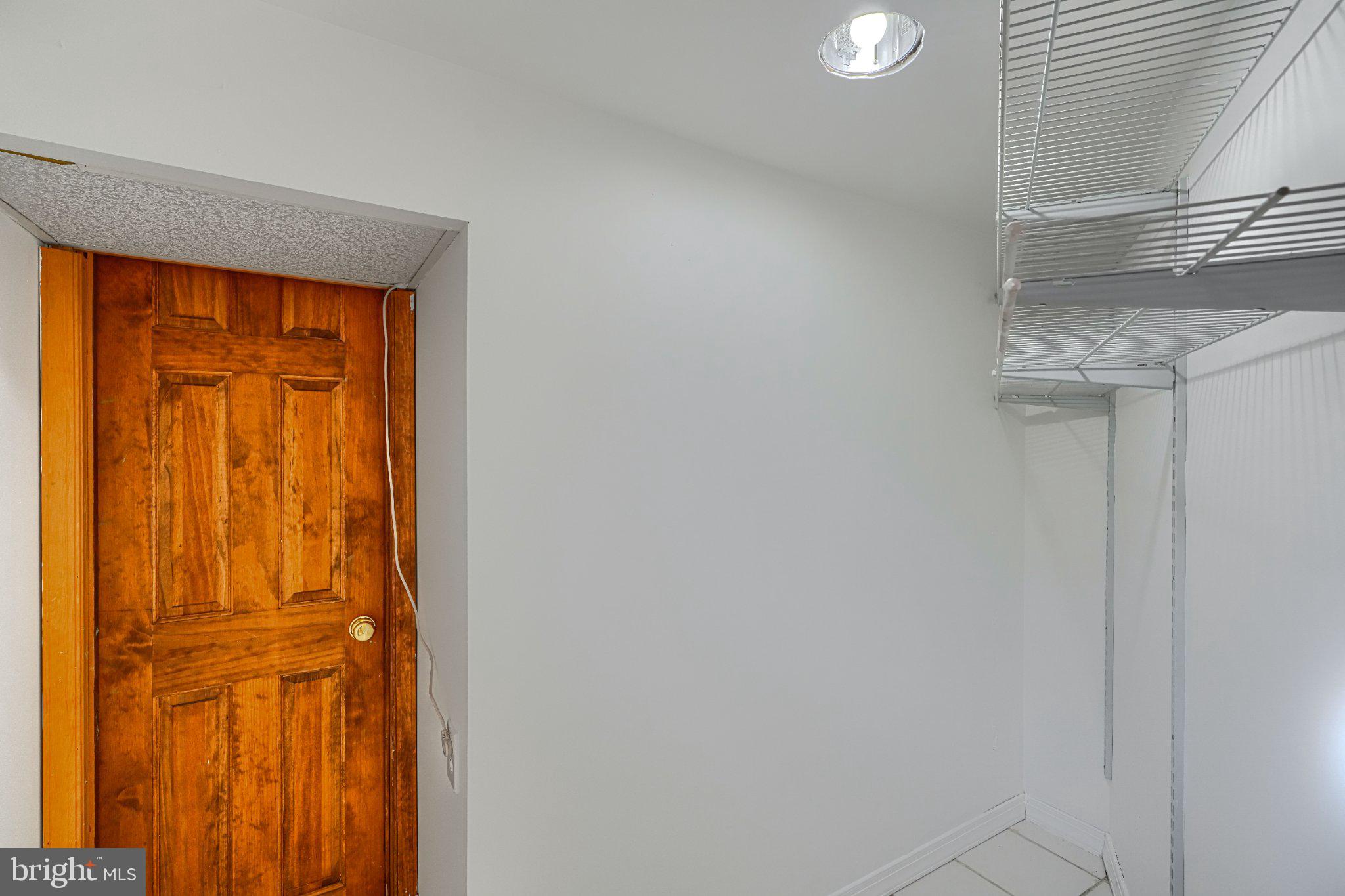 1835 Loch Shiel Road Towson, MD 21286 - Photo 59 of 75 Spacious closet with wooden door charm.