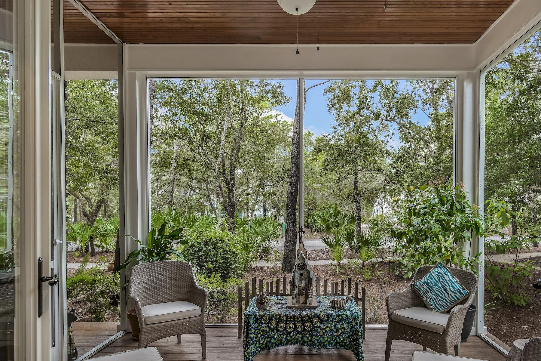 304 Wilderness Way Santa Rosa Beach, FL 32459 - Photo 11 of 48 a house view with a sitting space and garden view