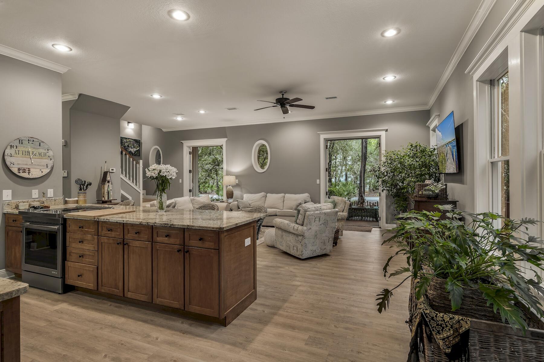 304 Wilderness Way Santa Rosa Beach, FL 32459 - Photo 21 of 48 a large kitchen with lots of counter space and living room