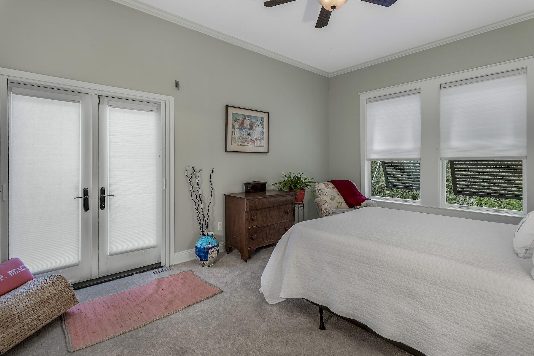 304 Wilderness Way Santa Rosa Beach, FL 32459 - Photo 37 of 48 a bedroom with a bed a couch and a window