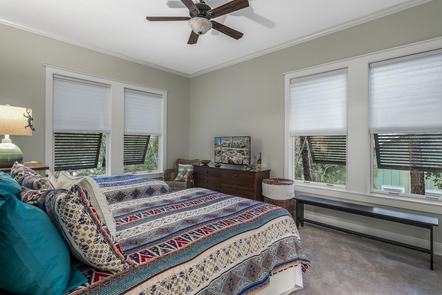 304 Wilderness Way Santa Rosa Beach, FL 32459 - Photo 41 of 48 a bedroom with a large bed and windows