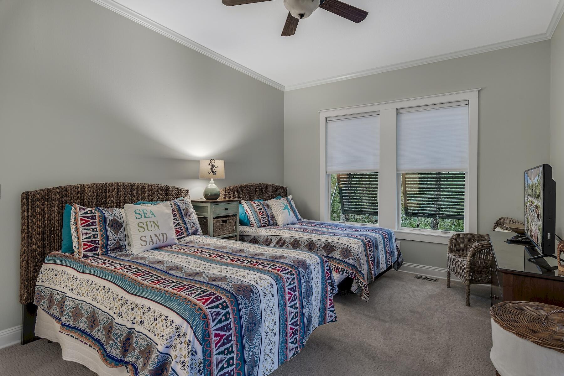 304 Wilderness Way Santa Rosa Beach, FL 32459 - Photo 42 of 48 a bedroom with bed couch and window
