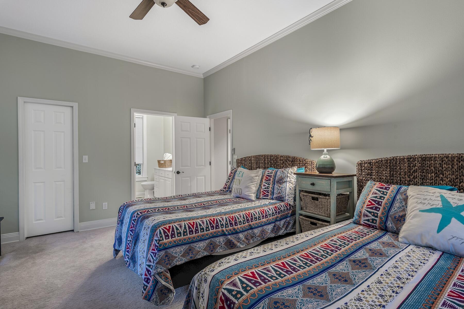 304 Wilderness Way Santa Rosa Beach, FL 32459 - Photo 43 of 48 a bedroom with bed and wooden floor