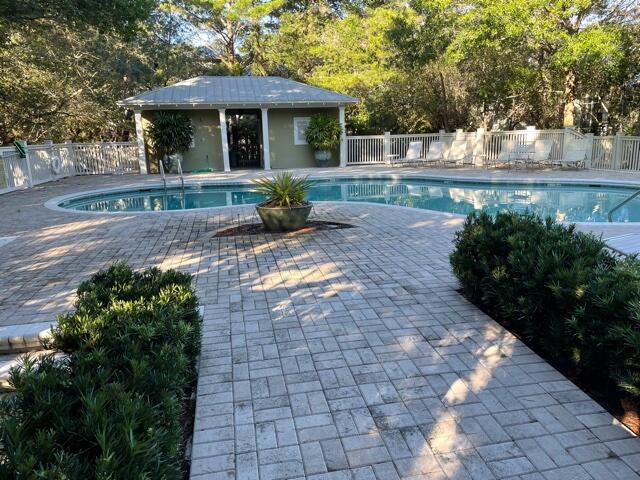 304 Wilderness Way Santa Rosa Beach, FL 32459 - Photo 47 of 48 a front view of a house with garden