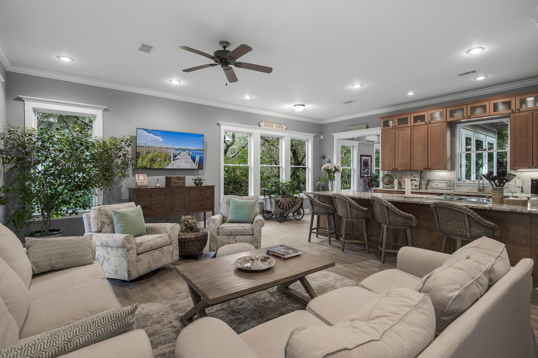 304 Wilderness Way Santa Rosa Beach, FL 32459 - Photo 7 of 48 a living room with furniture and a large window