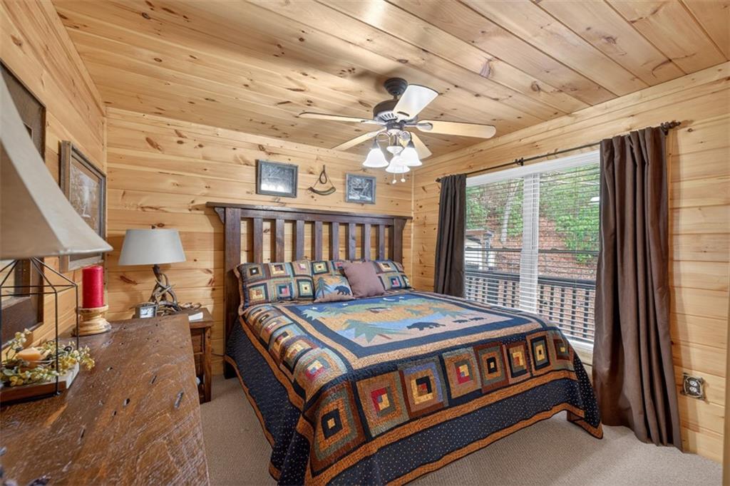 88 Crest Road Blairsville, GA 30512 - Photo 18 of 75 a bedroom with furniture and a window