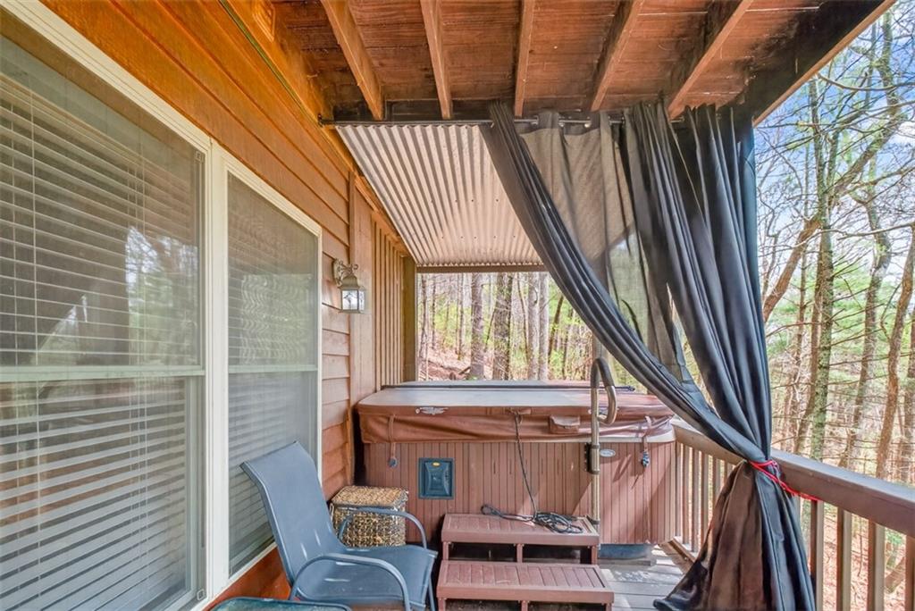 88 Crest Road Blairsville, GA 30512 - Photo 38 of 75 a view of balcony with wooden floor and outdoor seating