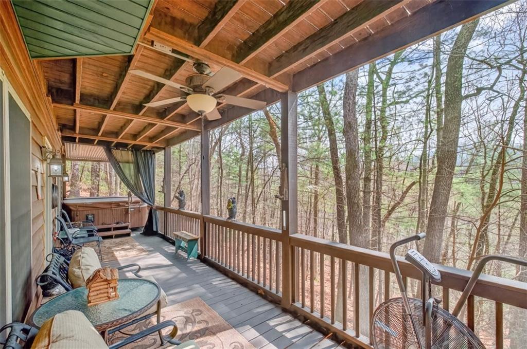 88 Crest Road Blairsville, GA 30512 - Photo 40 of 75 a view of a chairs and table in the balcony