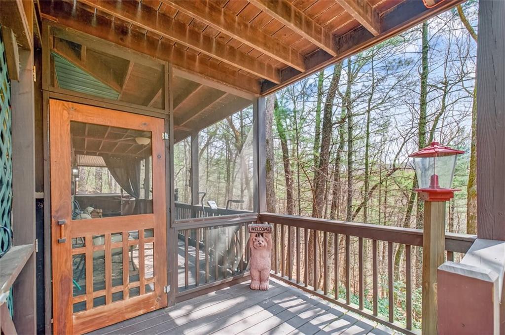 88 Crest Road Blairsville, GA 30512 - Photo 41 of 75 a view of a porch with a backyard