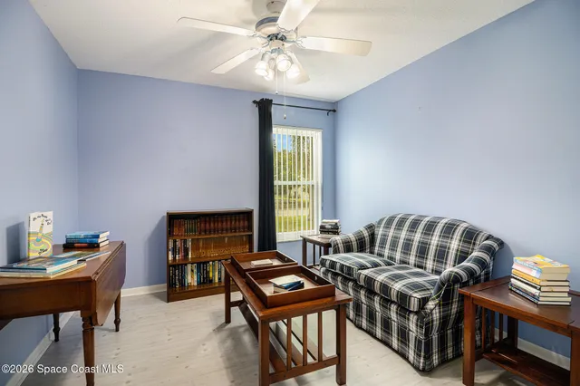 a view of a livingroom with furniture