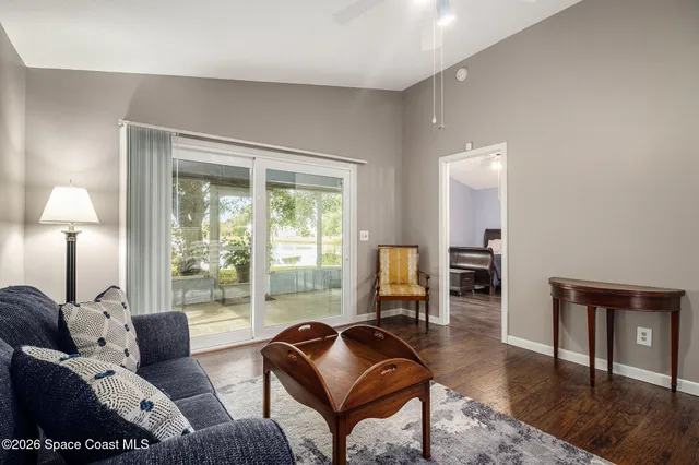 a living room with furniture kitchen and a rug