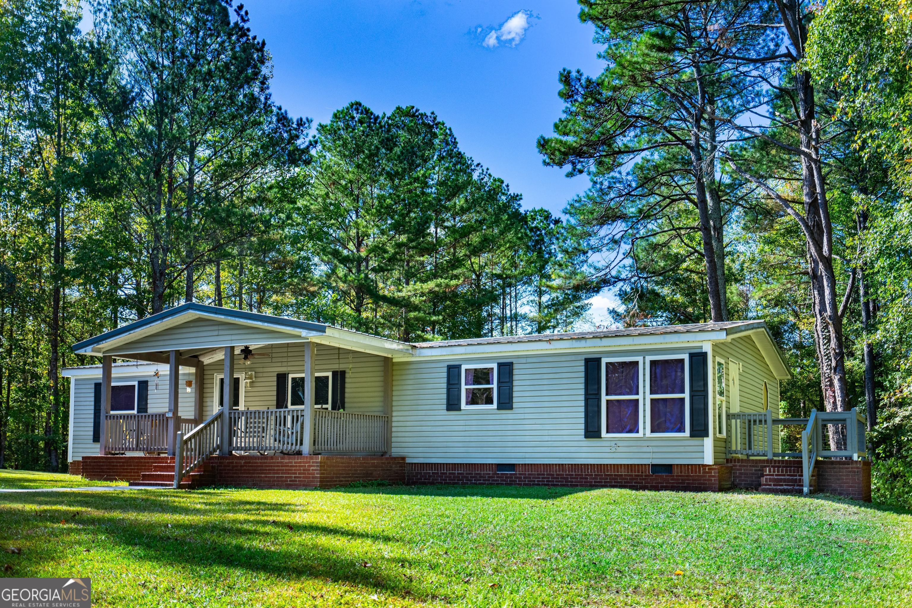 1551 5 Notch Road Franklin, GA 30217 - Photo 1 of 1 a front view of a house with a yard