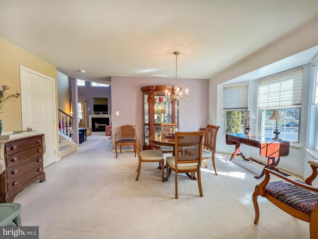 201 Raintree Crossing Hatfield, PA 19440 - Photo 12 of 46 a living room with furniture and a window