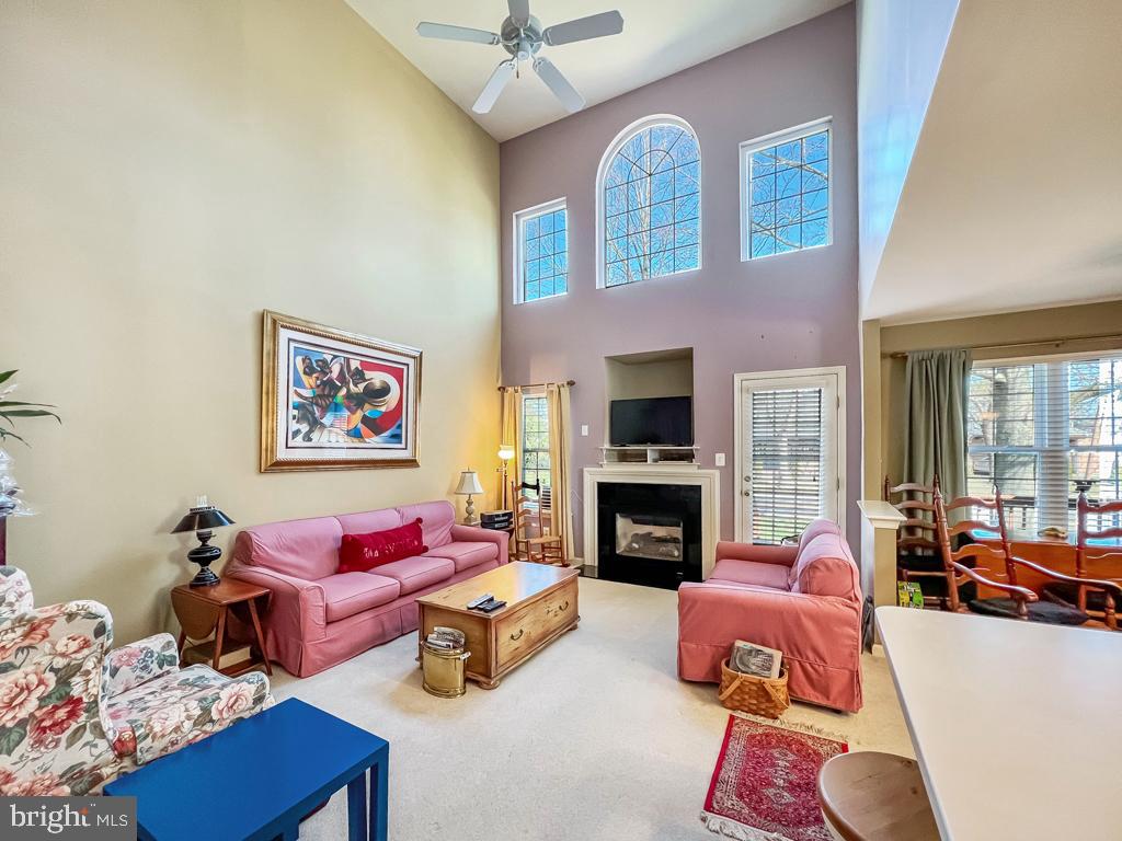 201 Raintree Crossing Hatfield, PA 19440 - Photo 14 of 46 a living room with furniture or couch and a fireplace
