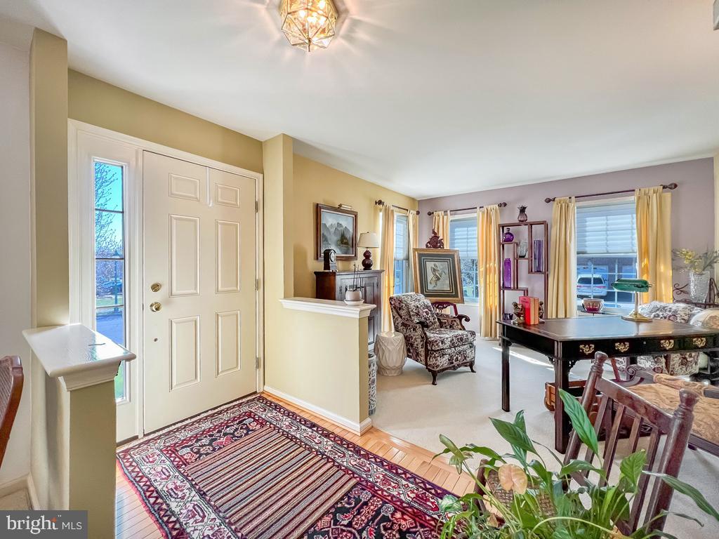 201 Raintree Crossing Hatfield, PA 19440 - Photo 18 of 46 a living room with furniture and a table