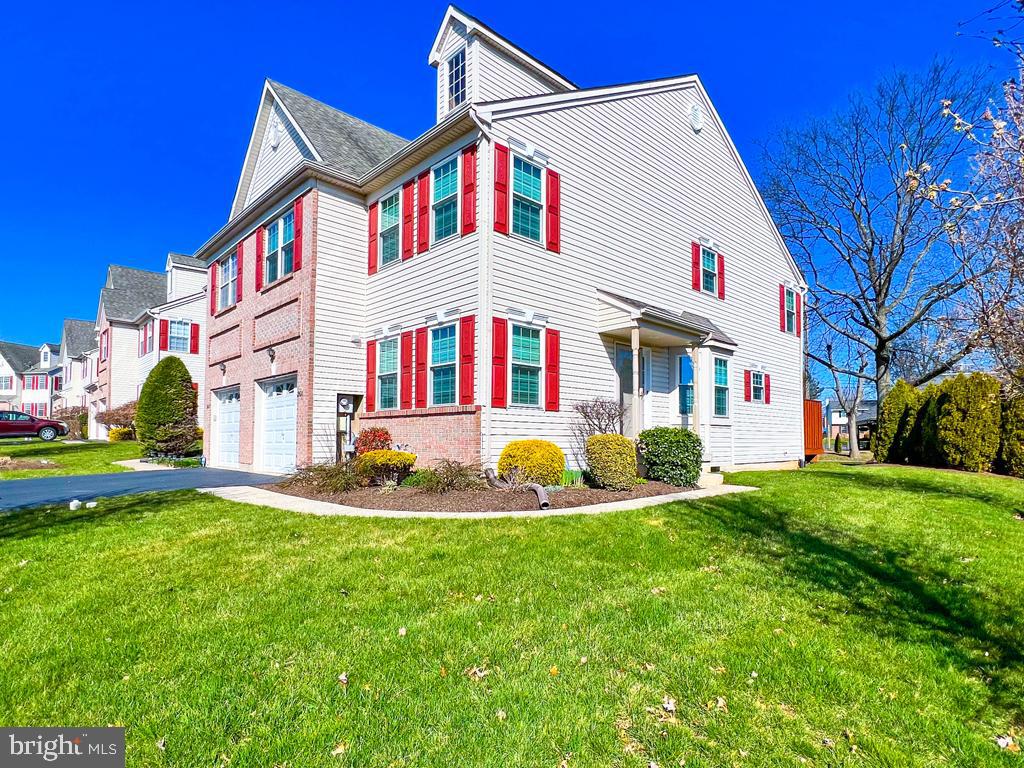201 Raintree Crossing Hatfield, PA 19440 - Photo 2 of 46 a front view of house with yard and green space
