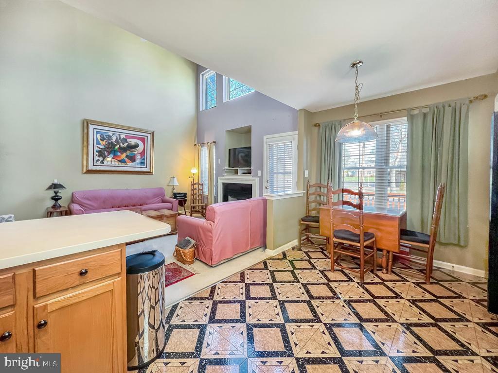 201 Raintree Crossing Hatfield, PA 19440 - Photo 23 of 46 a spacious bedroom with a bed and a chandelier