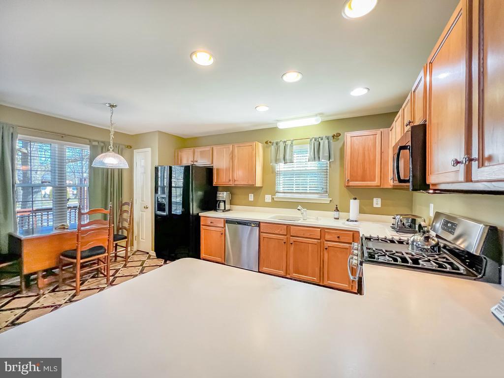 201 Raintree Crossing Hatfield, PA 19440 - Photo 24 of 46 a large kitchen with stainless steel appliances lots of counter top space