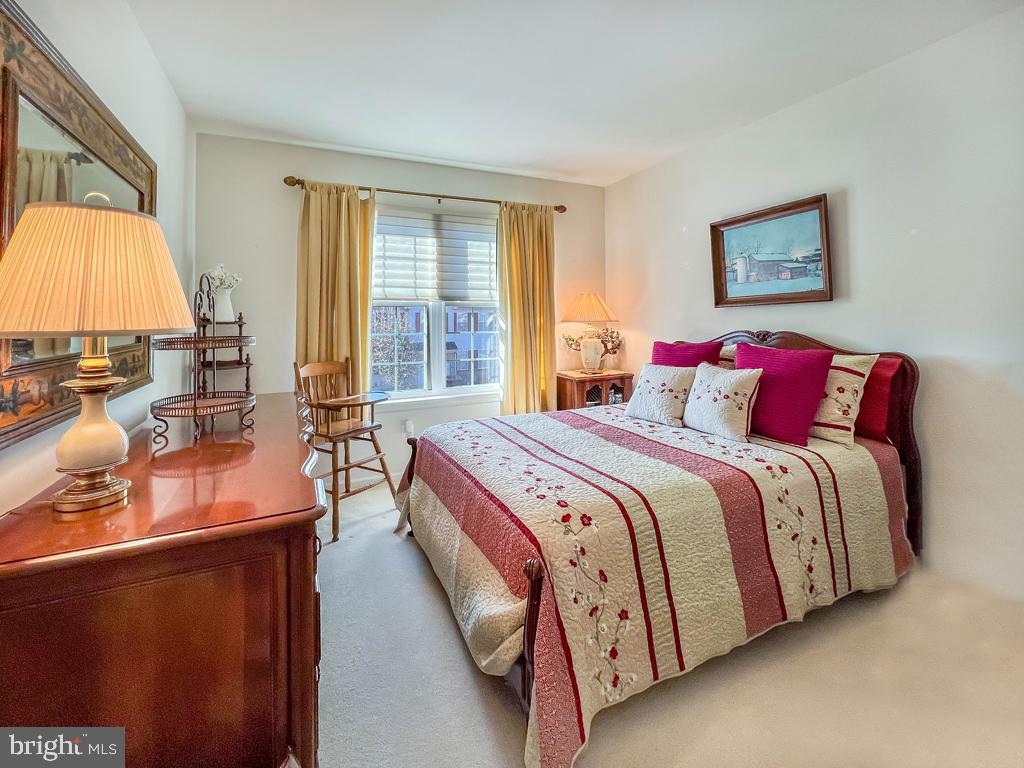 201 Raintree Crossing Hatfield, PA 19440 - Photo 28 of 46 a bedroom with a bed and a large window