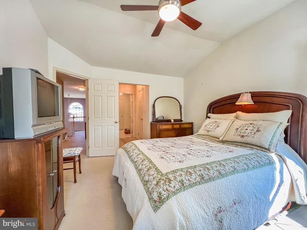 201 Raintree Crossing Hatfield, PA 19440 - Photo 35 of 46 a bedroom with a bed and wooden floor
