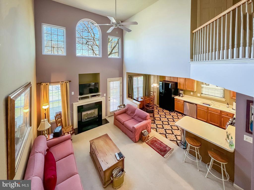 201 Raintree Crossing Hatfield, PA 19440 - Photo 6 of 46 a living room with furniture fireplace and flat screen tv