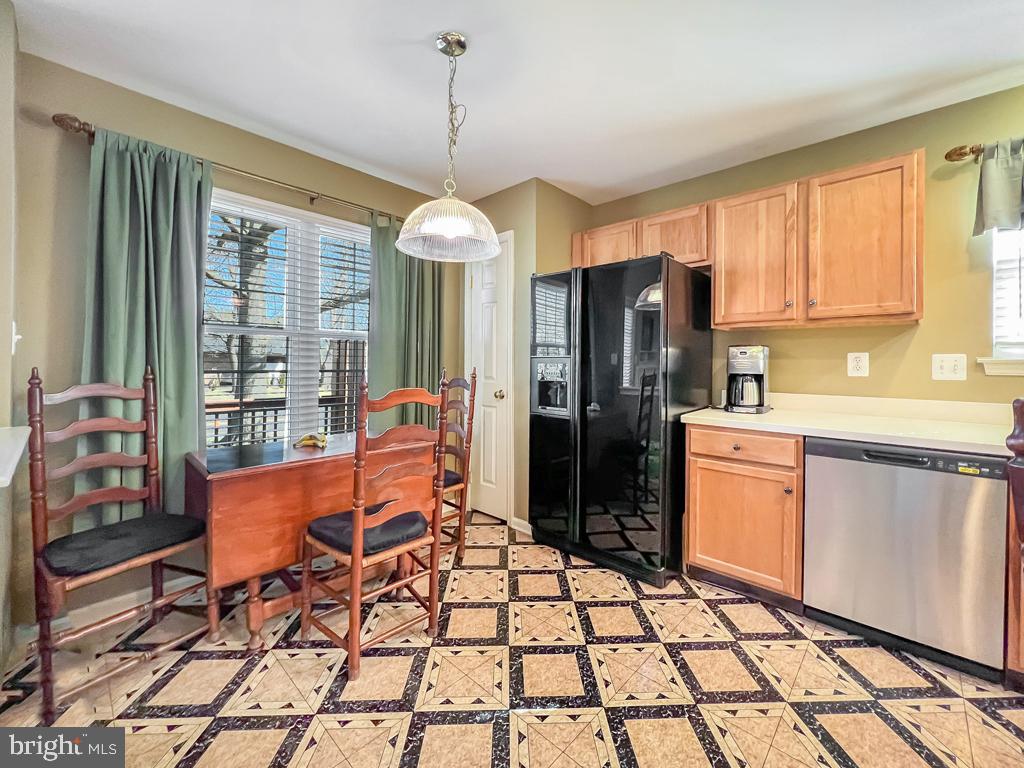201 Raintree Crossing Hatfield, PA 19440 - Photo 7 of 46 a kitchen with stainless steel appliances granite countertop a refrigerator and a stove top oven