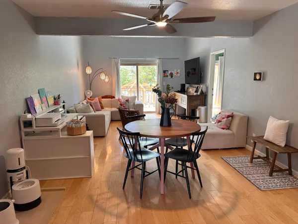 a living room with furniture and a table