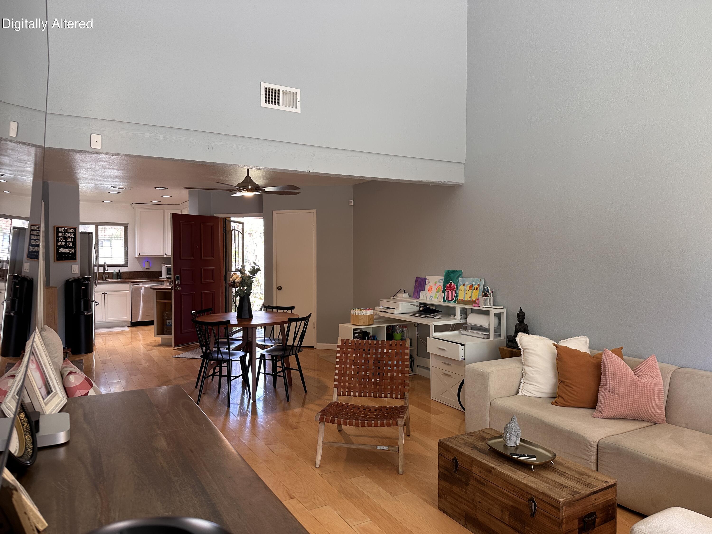 48255 Monroe Street, Unit 5 Indio, CA 92201 - Photo 18 of 57 a living room with furniture and a table