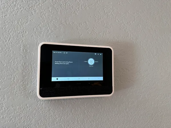 a bathroom with a sink a toilet a tub and a window