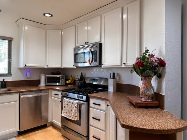 a view of a room with furniture