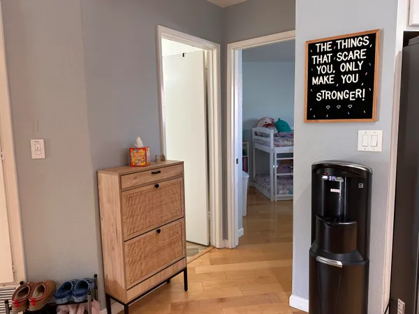 a view of a glass door and a floor to ceiling window