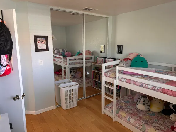 a bathroom with a sink mirror and vanity