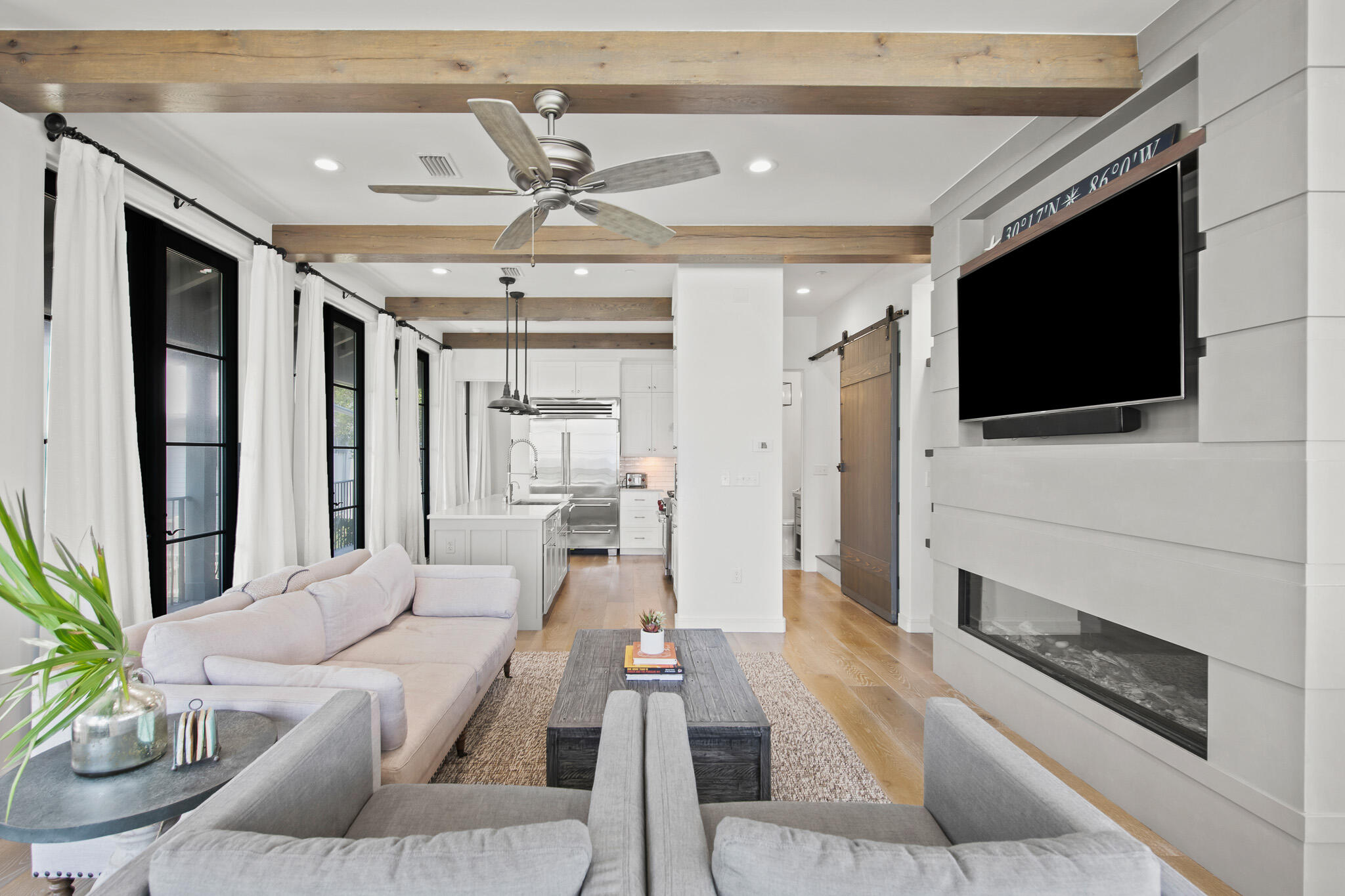70 Windward Lane Rosemary Beach, FL 32461 - Photo 35 of 101 a living room with furniture and a flat screen tv
