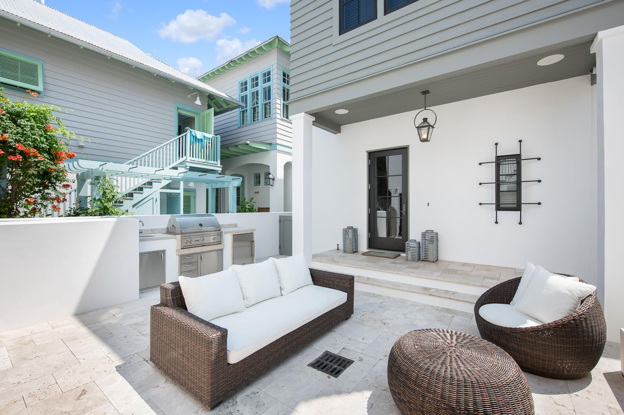 70 Windward Lane Rosemary Beach, FL 32461 - Photo 72 of 101 a view of a patio with couches chairs and a potted plant