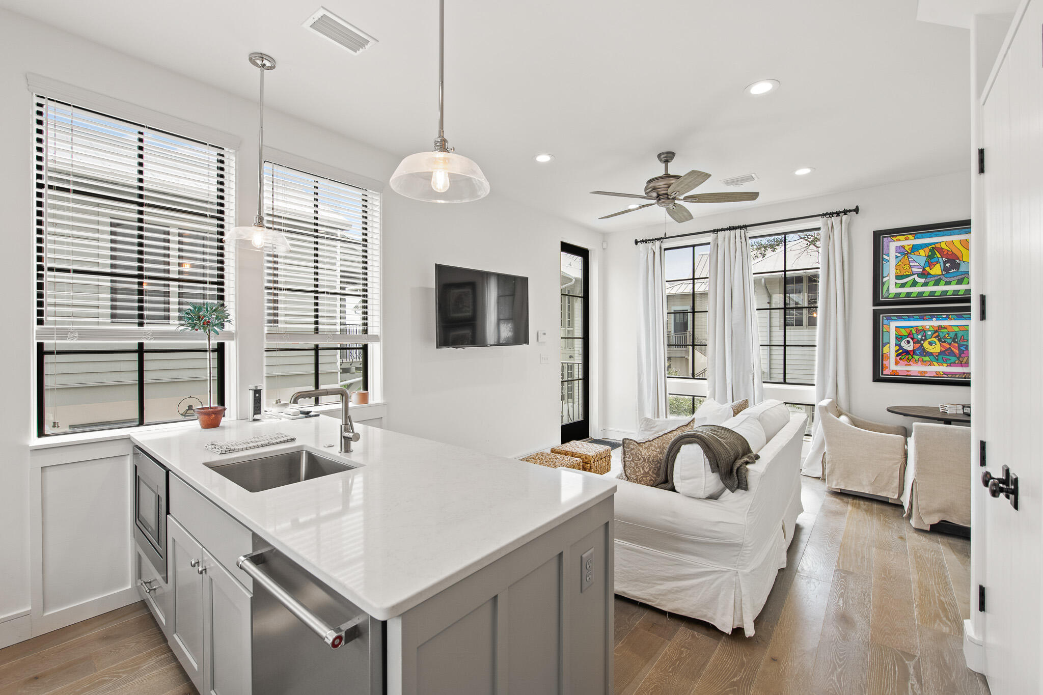70 Windward Lane Rosemary Beach, FL 32461 - Photo 80 of 101 a large living room with stainless steel appliances furniture a flat screen tv and a large window