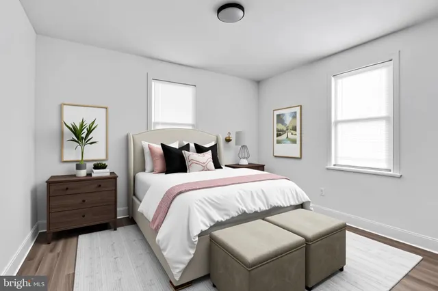 a bedroom with bed and window