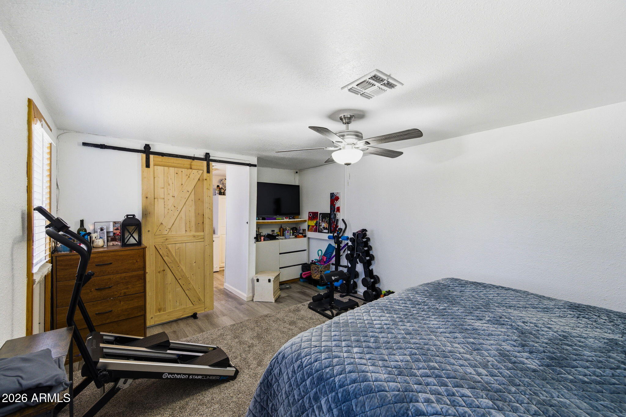 1268 East Rodeo Road Casa Grande, AZ 85122 - Photo 12 of 27 a view of a room with gym equipment