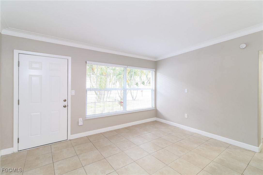 315 Ginger Road Venice, FL 34293 - Photo 2 of 16 a view of an empty room with a window