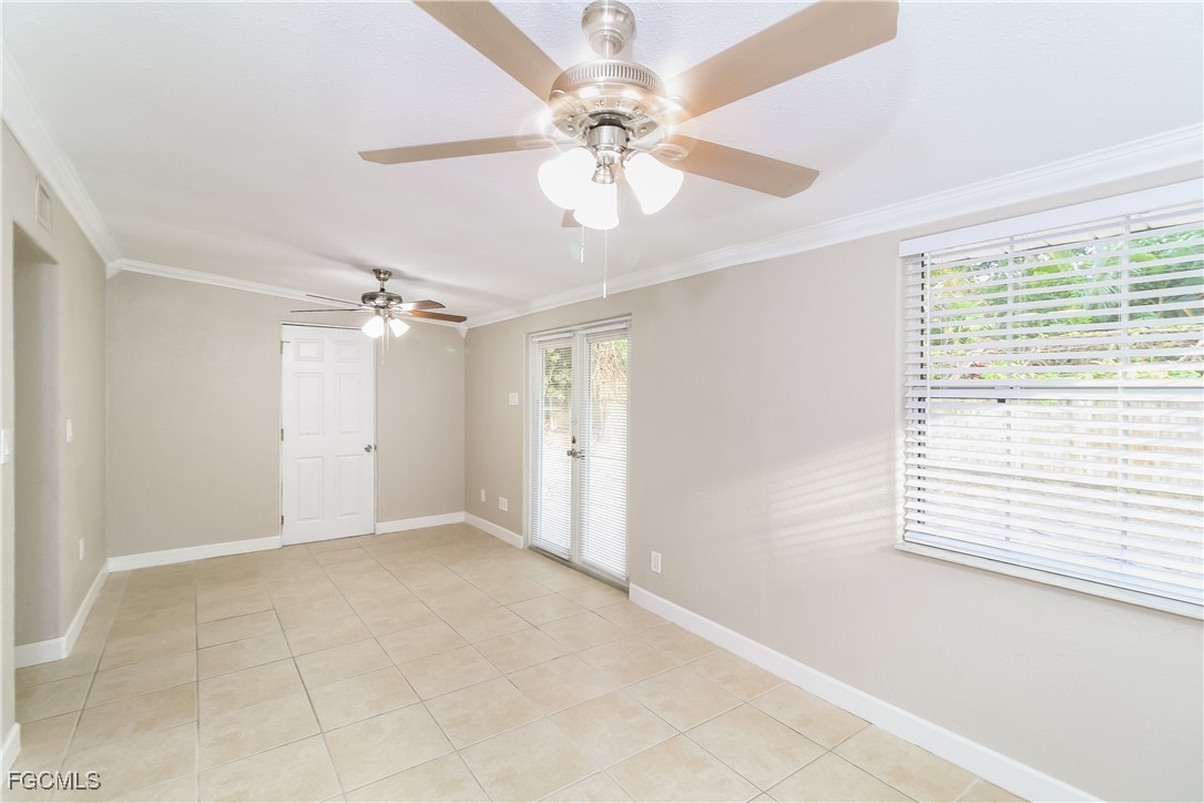 315 Ginger Road Venice, FL 34293 - Photo 4 of 16 a view of an empty room with a window