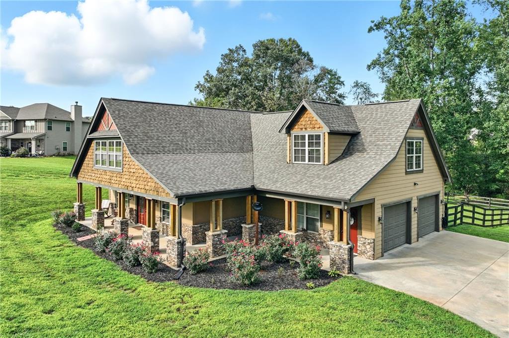 5911 Bent Tree Way Clermont, GA 30527 - Photo 12 of 56 front view of a house with a yard