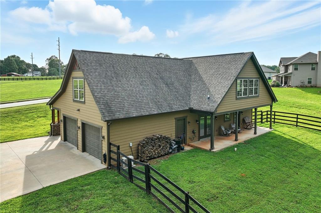 5911 Bent Tree Way Clermont, GA 30527 - Photo 21 of 56 an aerial view of a house having patio
