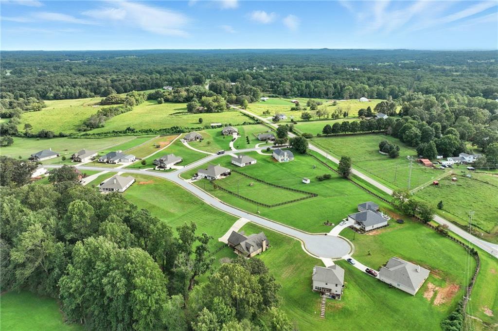 5911 Bent Tree Way Clermont, GA 30527 - Photo 24 of 56 an aerial view of tennis court
