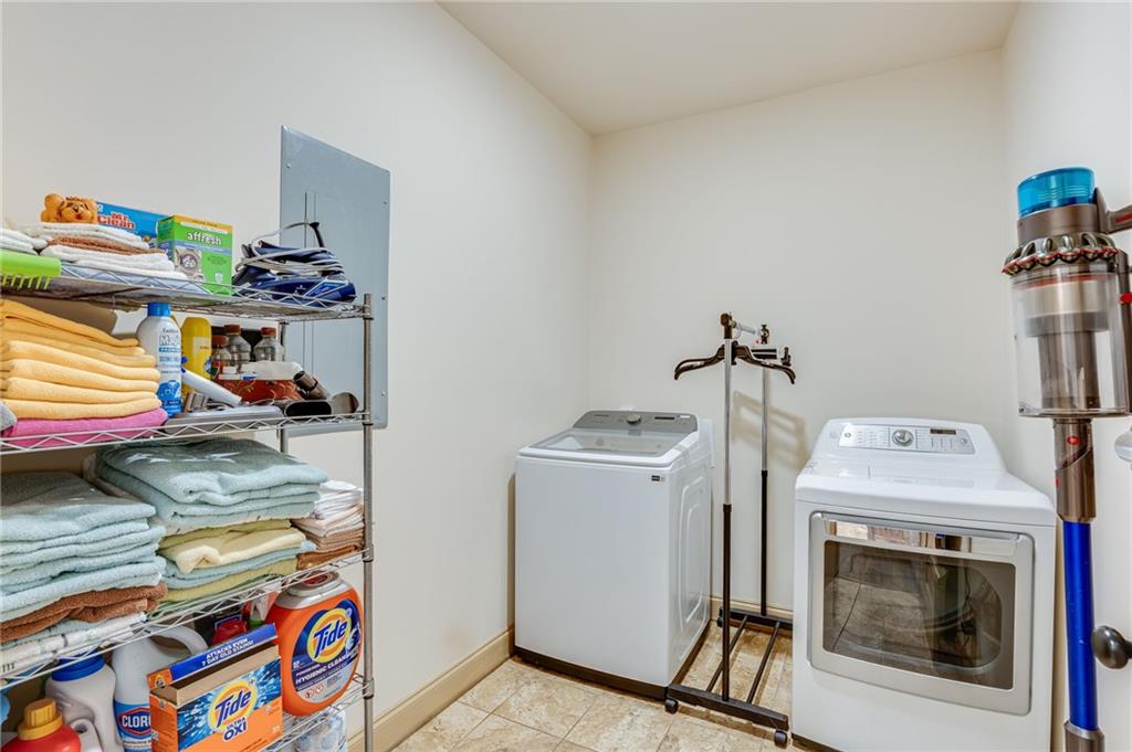 5911 Bent Tree Way Clermont, GA 30527 - Photo 39 of 56 a utility room with dryer and washer
